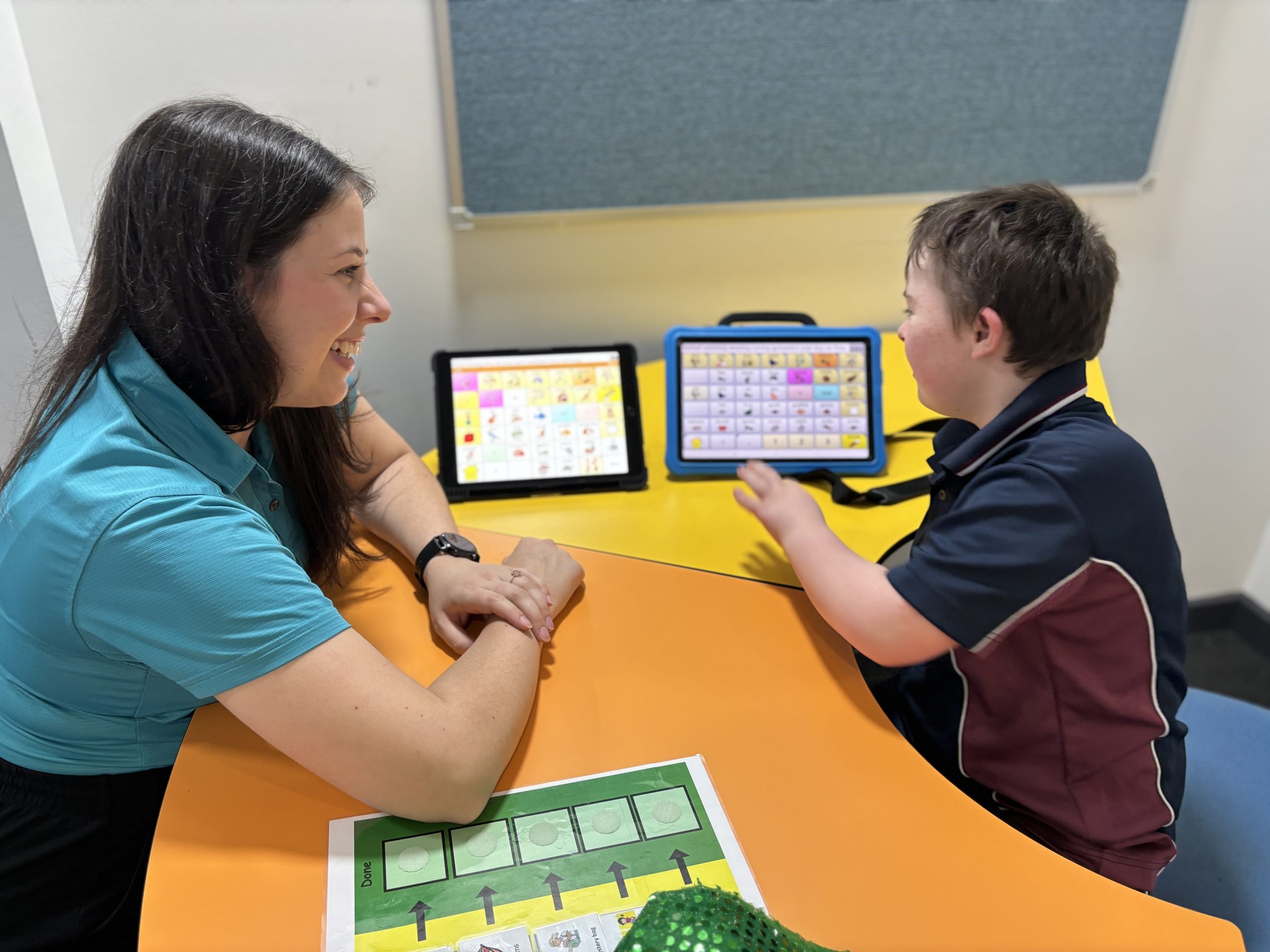 Speech Therapist Tabitha Woodman with Connor during a session at Atwell College.